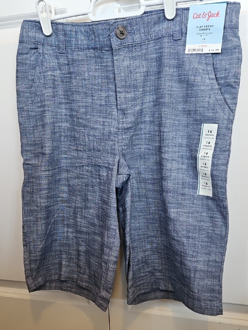 Boys Cat & Jack Brand Shorts. Size 18, with adjustable waist.  Blue Chambray.